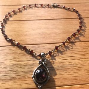 Gem-studded necklace with pendant